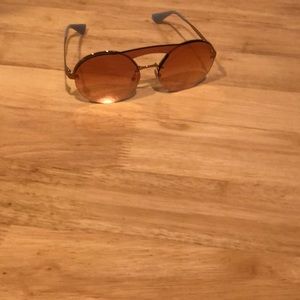 Prada round pink and gold sun glasses in good condition